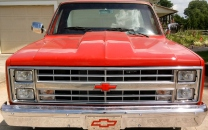 Red Chevrolet pickup from the Swifty's Auto Sales business card